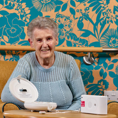 A customer with their Care Link equipment on display.